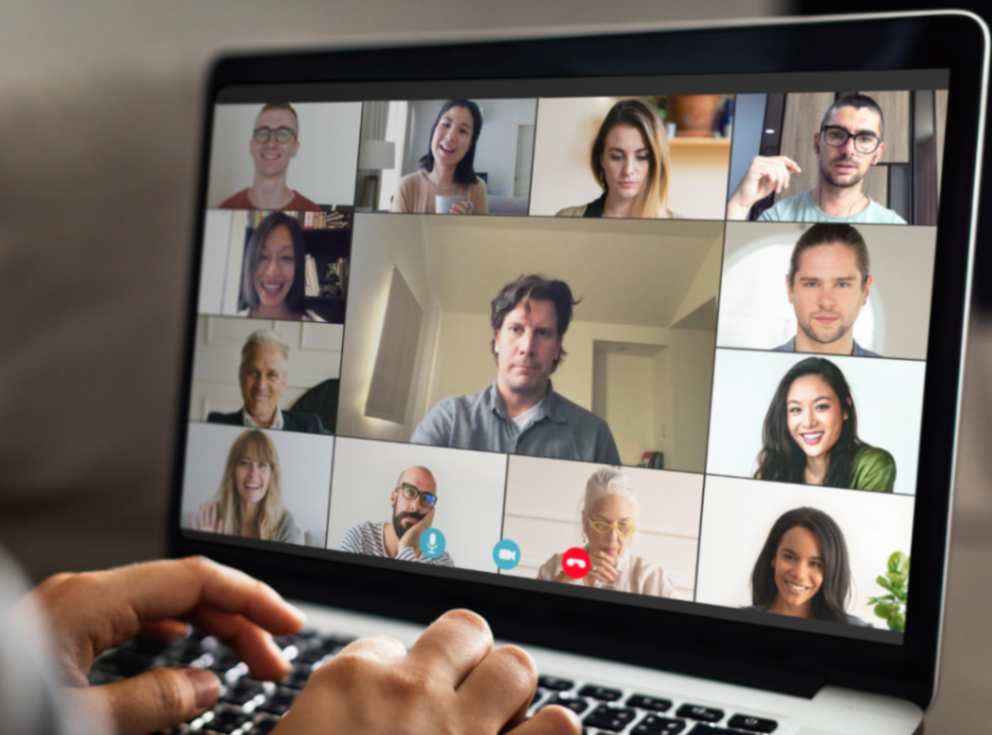Person smiling on a video meeting